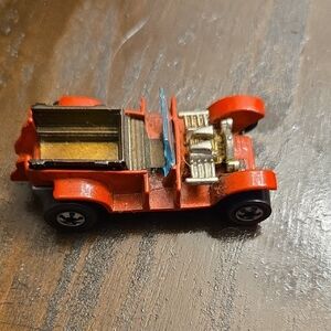 Classic Red Toy Car with Gold Accents